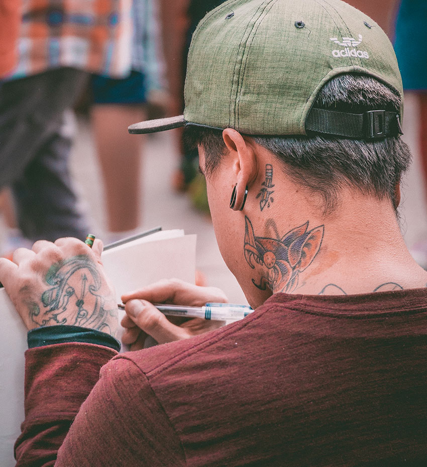 Tattoo Artist Sketching