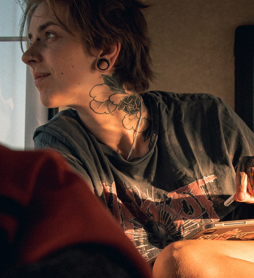 Woman with Tattoo in her Neck