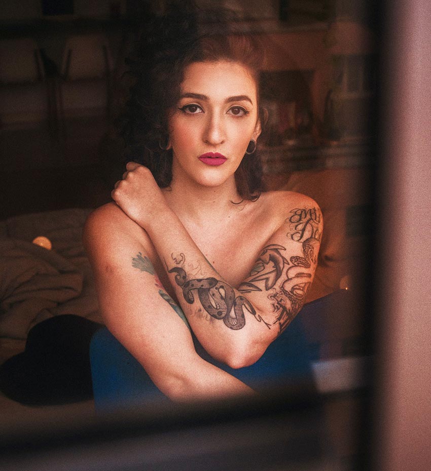 Woman with two Tattooed Arms
